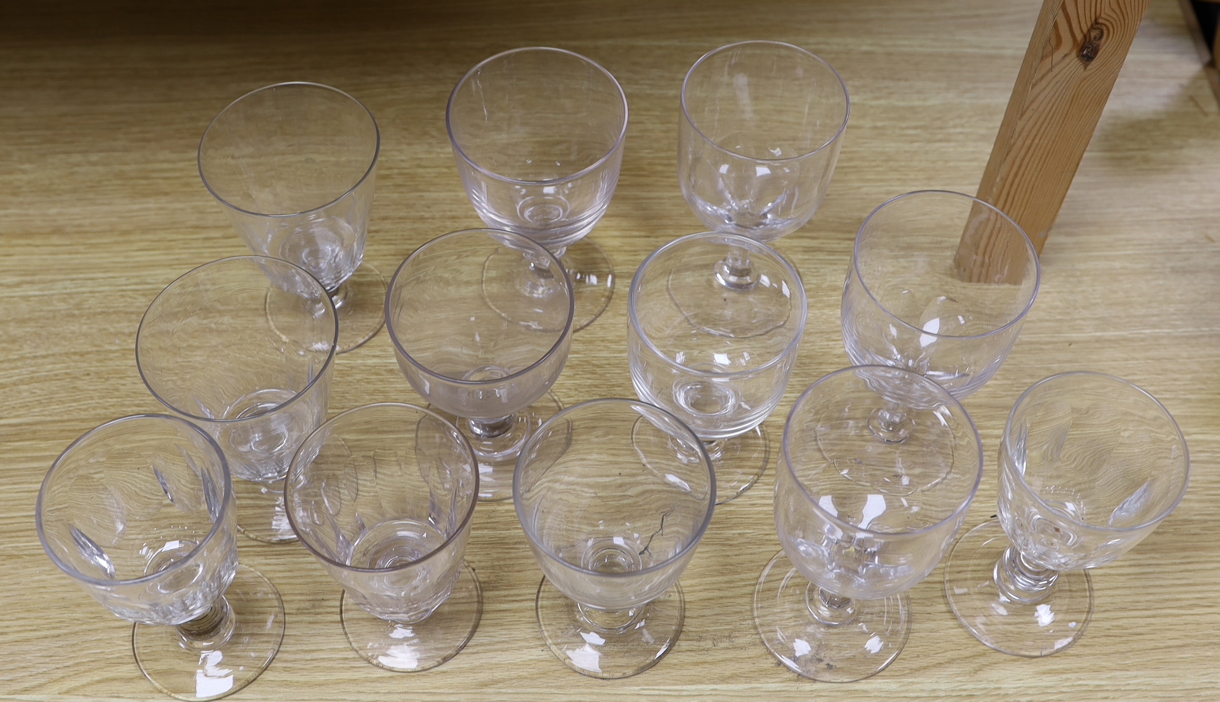 Twelve 19th / 20th century glass rummers, largest 17cm high